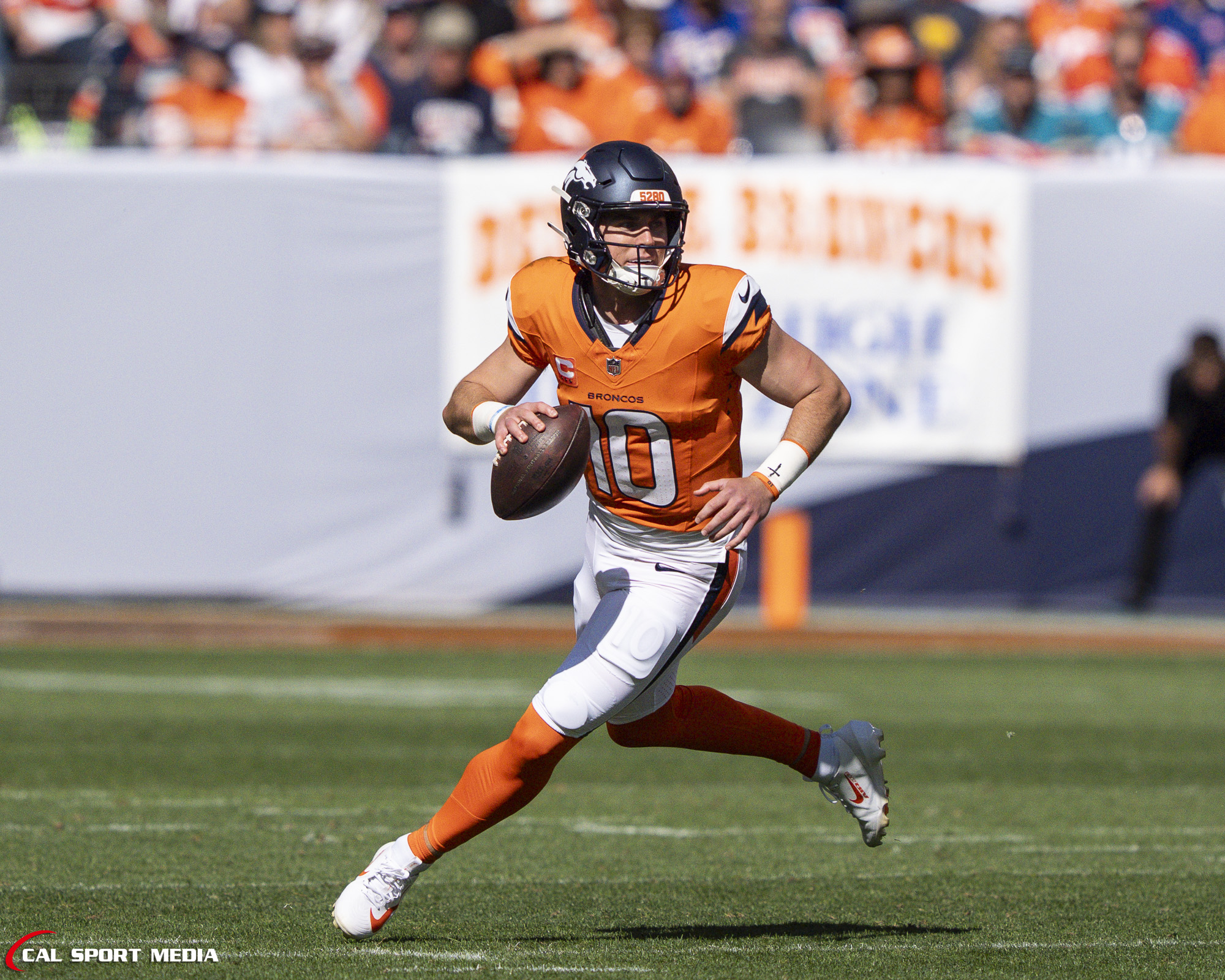 Sep 20, 2026; Denver Broncos quarterback Bo Nix (10)  scrambles during the game between the Denver Broncos and Jacksonville Jaguars in Denver, CO, USA; at Empower Field at Mile High. Mandatory Credit: Derek Regensburger-Cal Sport Media