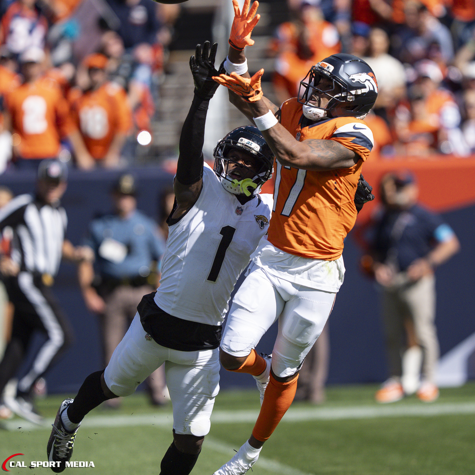 Sep 20, 2026; Denver Broncos wide receiver Jaylen Waddle (17) reaches out for a pass during the game between the Denver Broncos and Jacksonville Jaguars in Denver, CO, USA; at Empower Field at Mile High. Mandatory Credit: Derek Regensburger-Cal Sport Media