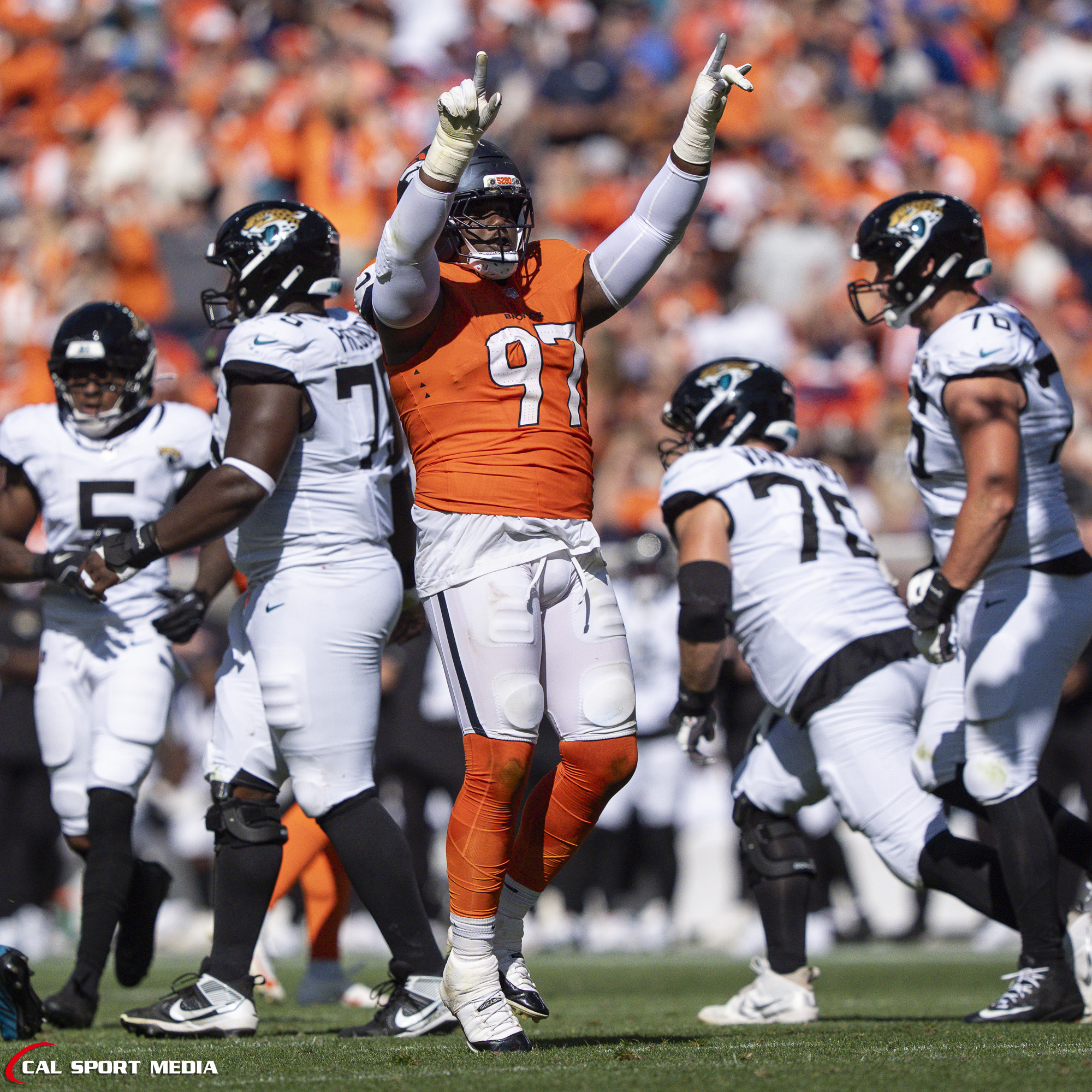 Sep 20, 2026; Denver Broncos defensive tackle Malcolm Roach (97) celebrates his sack during the game between the Denver Broncos and Jacksonville Jaguars in Denver, CO, USA; at Empower Field at Mile High. Mandatory Credit: Derek Regensburger-Cal Sport Media