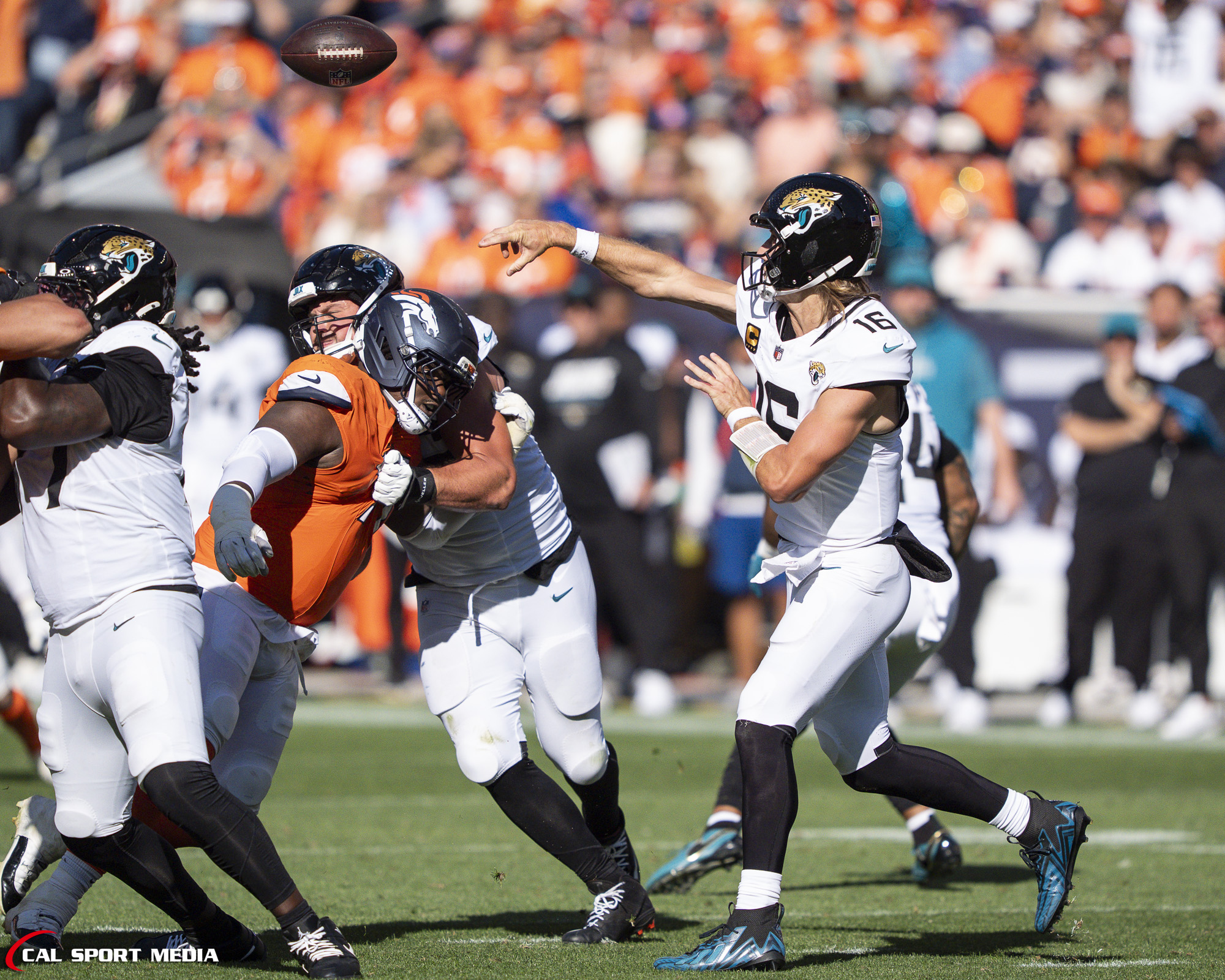 Sep 20, 2026; Jacksonville Jaguars quarterback Trevor Lawrence (16) throws a pass during the game between the Denver Broncos and Jacksonville Jaguars in Denver, CO, USA; at Empower Field at Mile High. Mandatory Credit: Derek Regensburger-Cal Sport Media