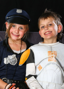 boy and girl in Halloween costume
